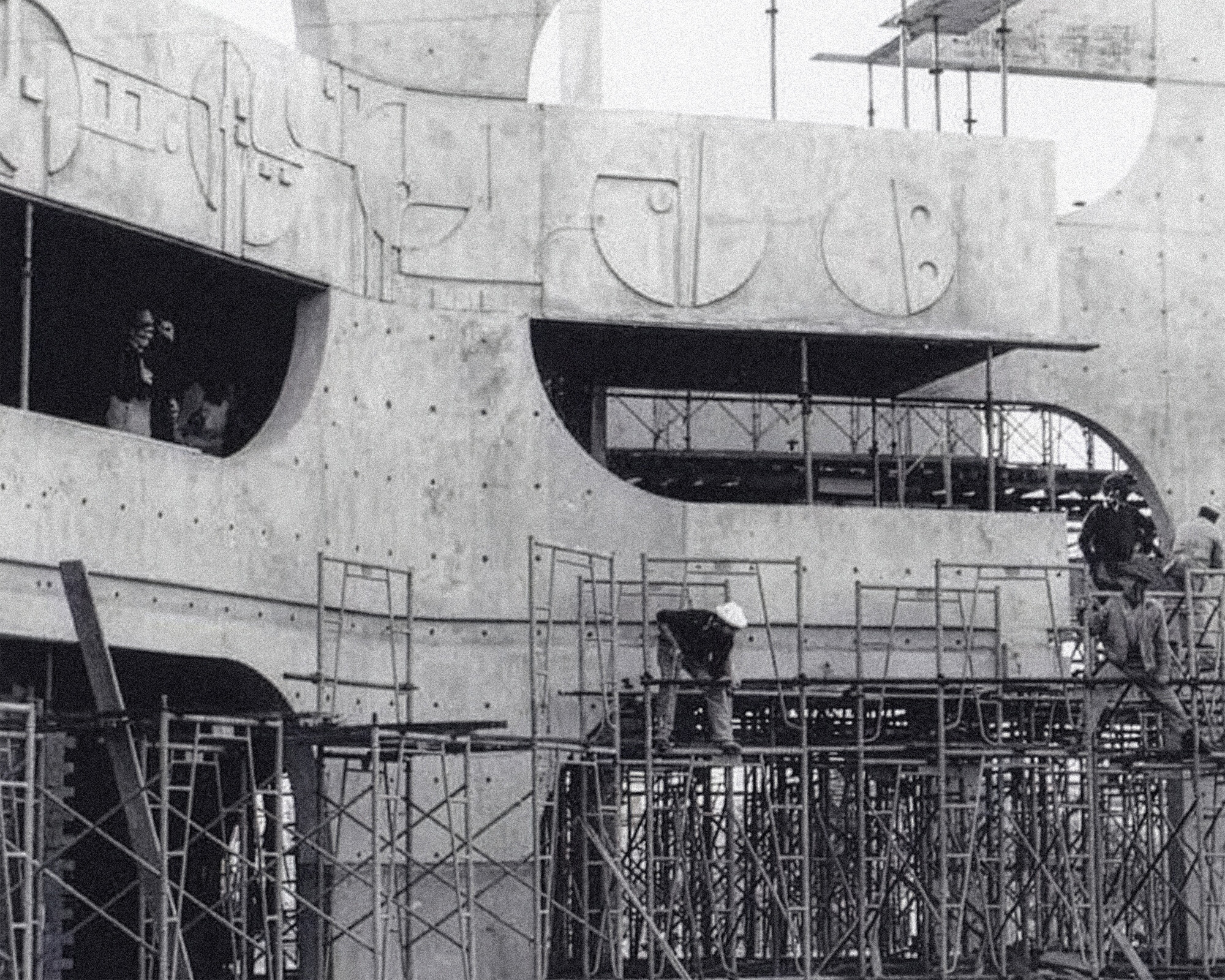 <p>The geometric motif set in concrete shown during construction. Photograph courtesy of the Veneto Club.</p>