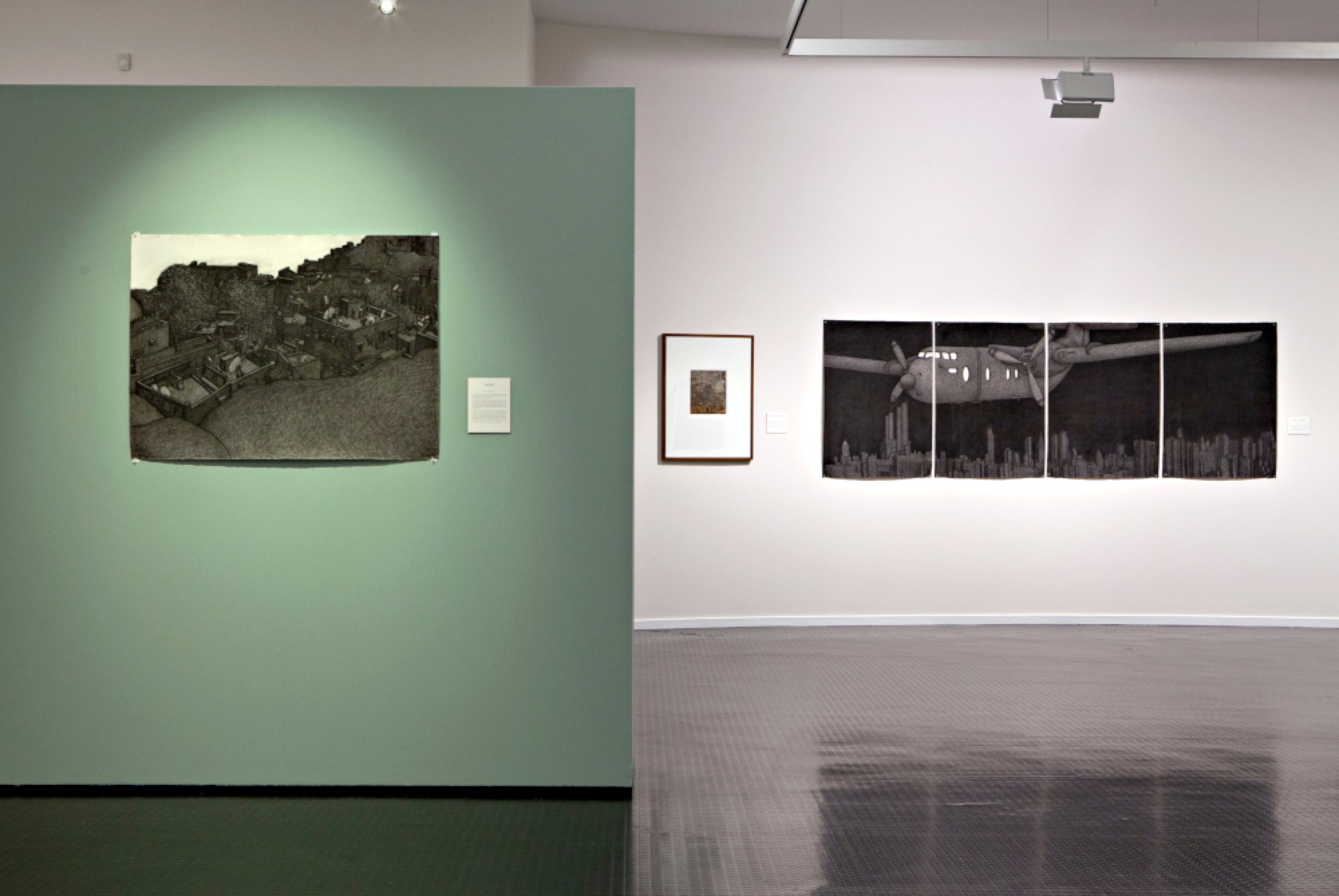 Installation detail of <em>Sans Frontières; prints, drawings and painting by Damon Kowarsky.</em>