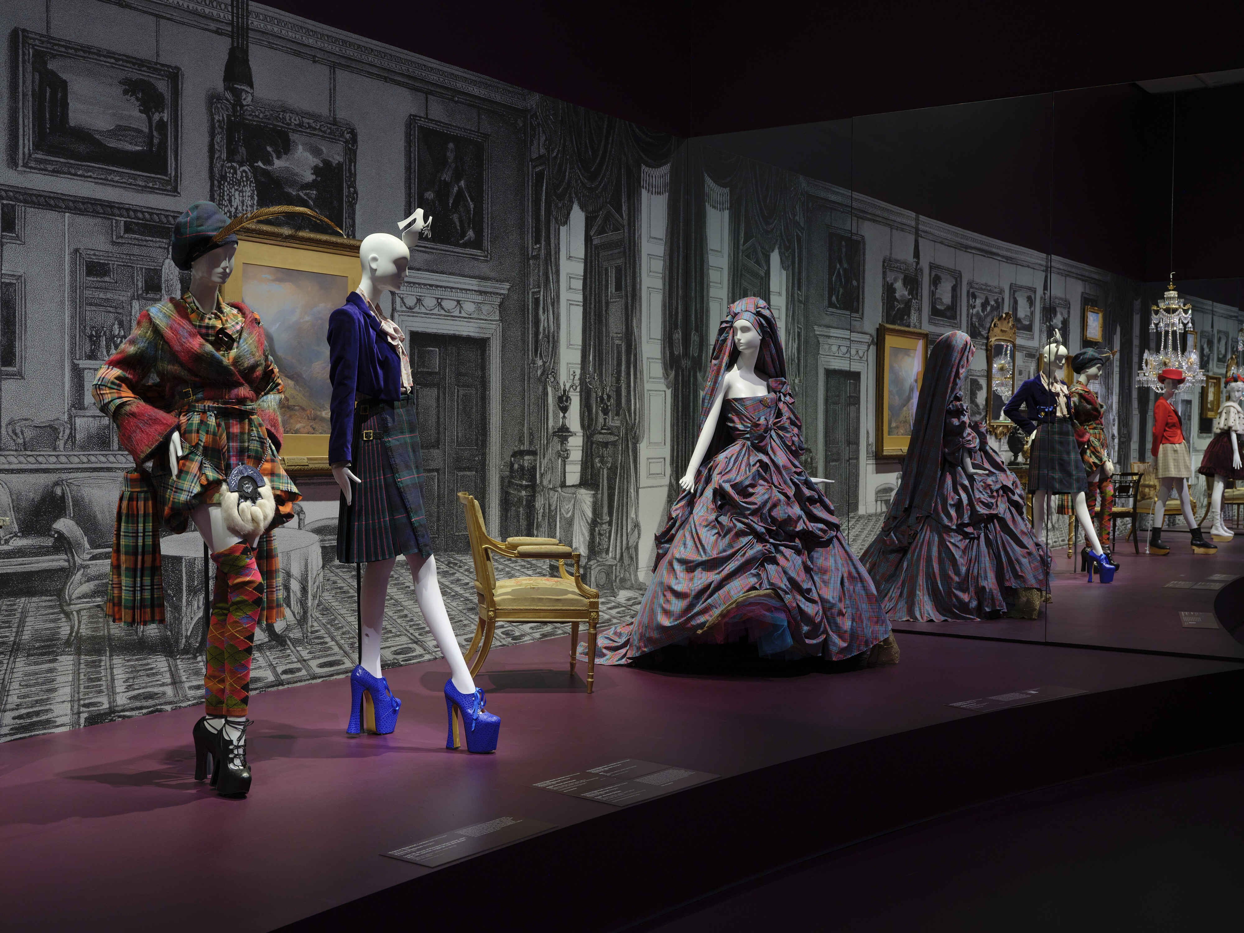 <p>Installation view of <em>Westwood | Kawakubo</em> at NGV International, Melbourne. Left: Vivienne Westwood Look 26, jacket, shirt, skirt, kilt, sporran, leggings, hat and shoes, 1993, <em>Anglomania</em> collection, autumn-winter, 1993-1994. Courtesy of Vivienne Westwood Heritage. Vivienne Westwood, kilt, 1993, <em>Anglomania</em> collection, autumn-winter, 1993–1994. Courtesy of Vivienne Westwood Heritage. Photo: Sean Fennessy</p>