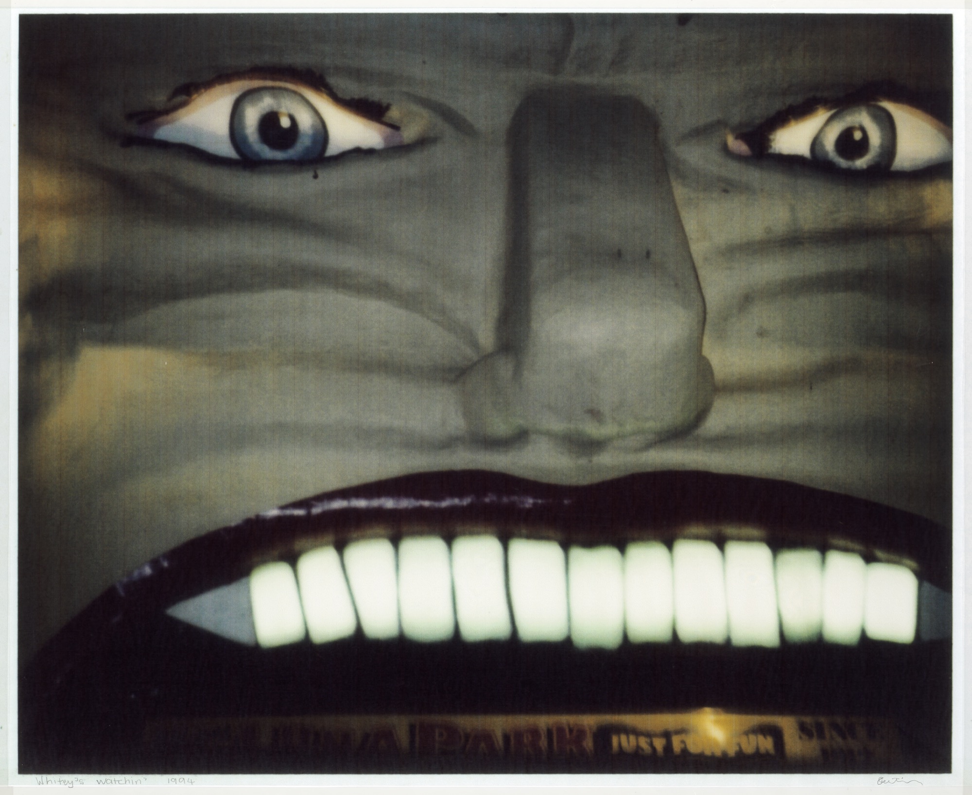 Destiny Deacon, <em>Whitey’s watchin’</em>. Colour photographic print, 1994, 26 × 21 cm, H99.222. Courtesy of the artist and Roslyn Oxley Gallery, Sydney.