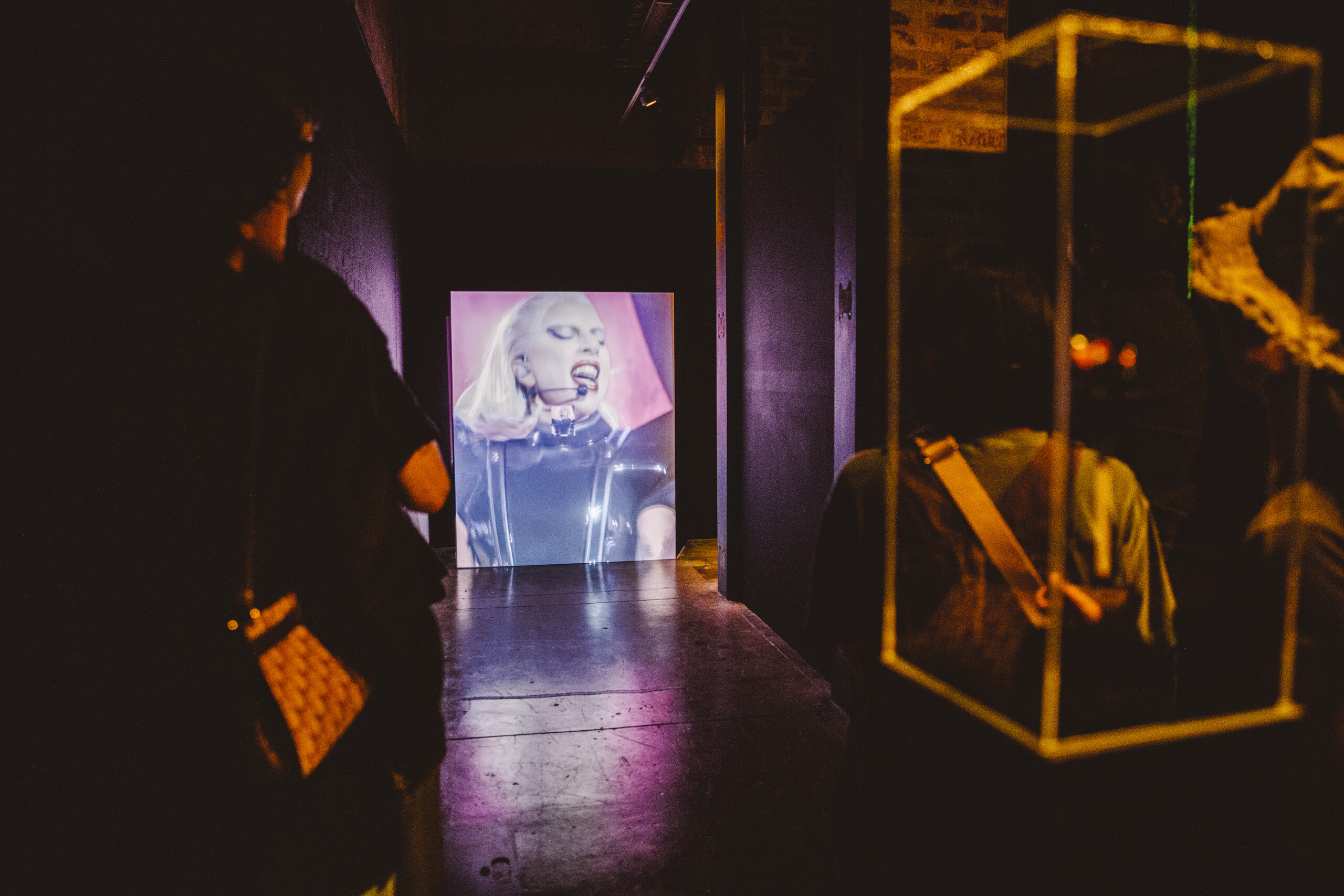 Ari Tampubolon, <em>Sour Candy</em>, 2022, Two-channel video with sound, installation view. Photo credit: Gianna Rizzo.