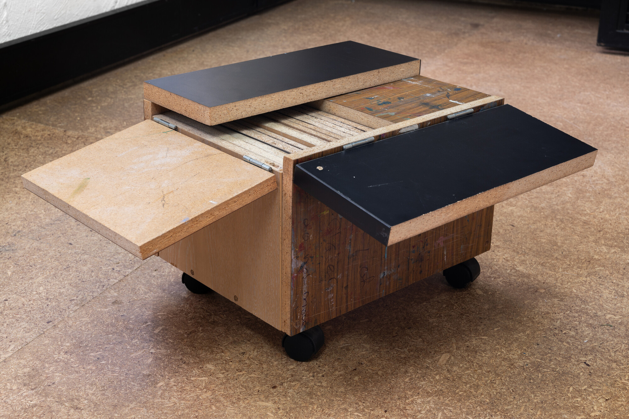 <p>Yusi Zang, <em>A Wooden Box Filled with Wood, </em>2016, school tables, hinges, dowel joints 40 x 32 x 32 cm. Photograph: Tommaso Nervegna-Reed. Image courtesy of the artist and Cache.</p>